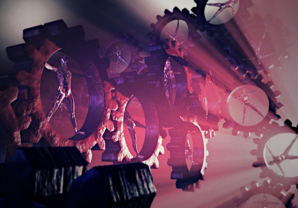 Ingegneria e figure umane dentro grandi ingranaggi metallici illuminati di viola